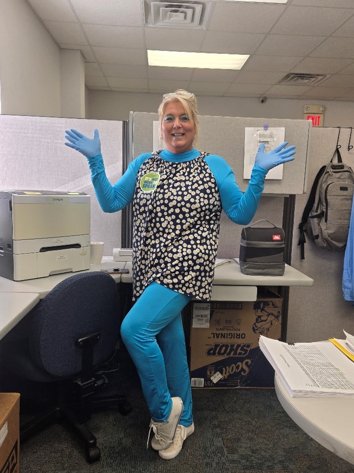 Woman wearing blue for Men's Health Awareness